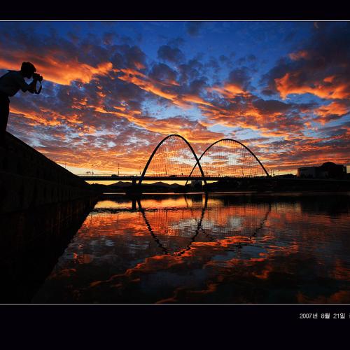 석양을 잡는 사람